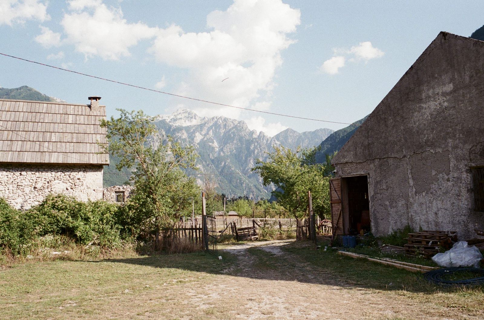 Stone houses and the Accursed Mountains.